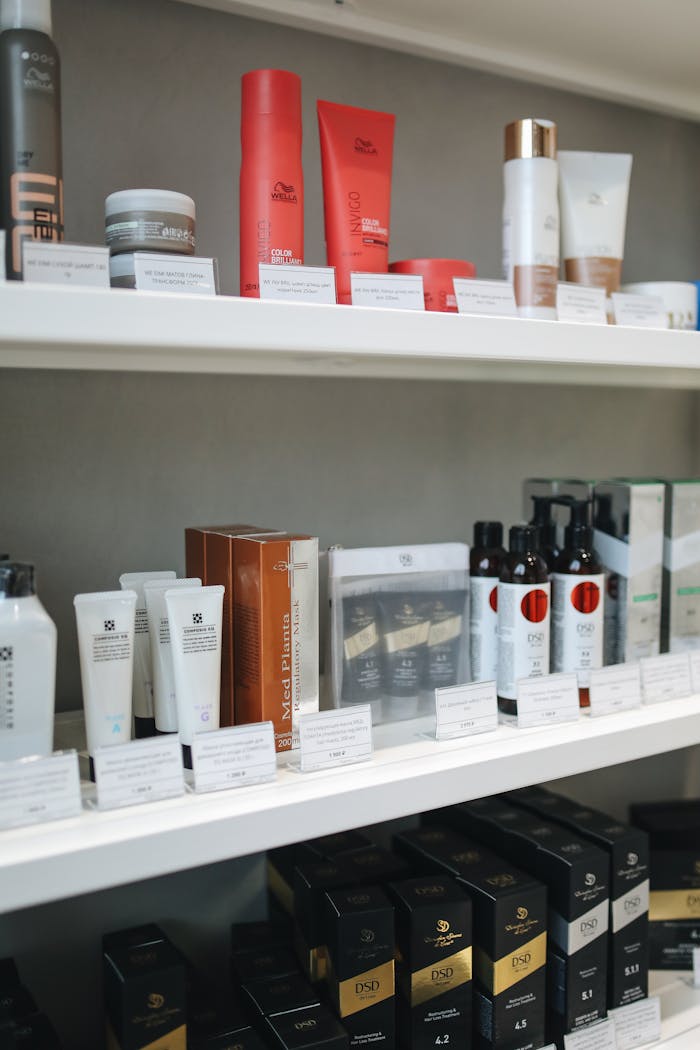 about-01 A variety of skincare and beauty products displayed neatly on store shelves.